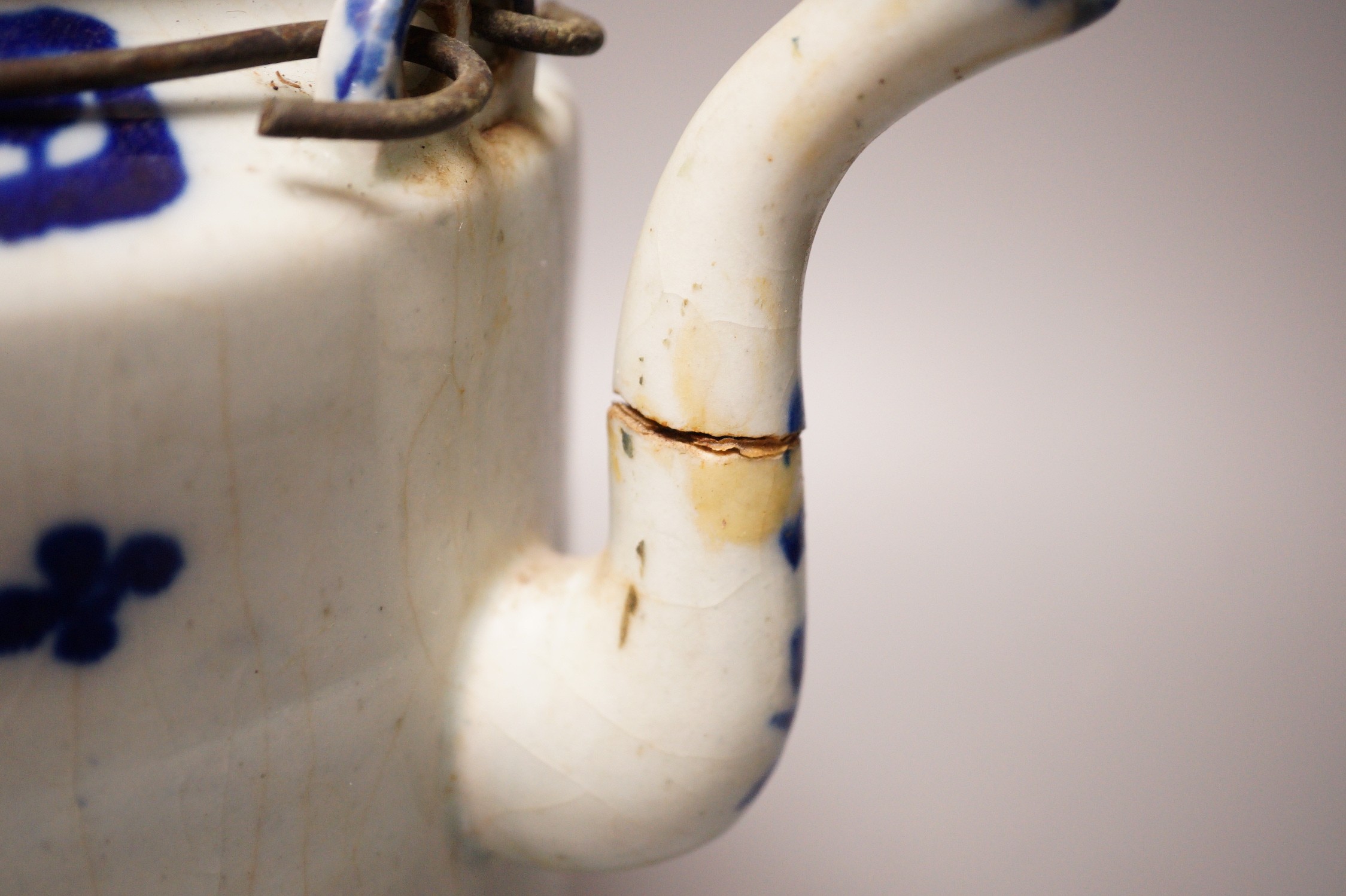 A Chinese provincial blue and white teapot, 23cm